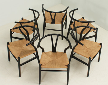 A SET  OF SIX WISHBONE CHAIRS BY HANS WEGNER