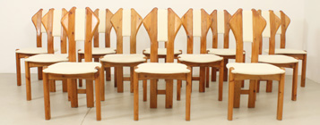 SET OF TWELVE BRUTALIST DINING CHAIRS BY HOLGER DANSKE
